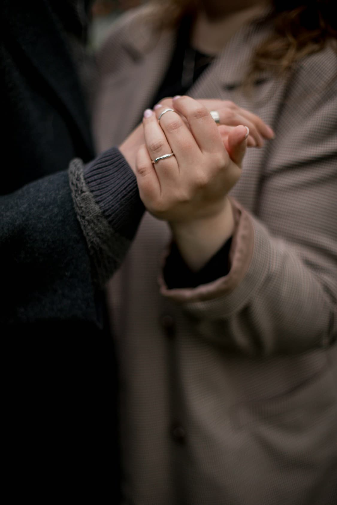 Couple holding hands, meeting their match and building their love life